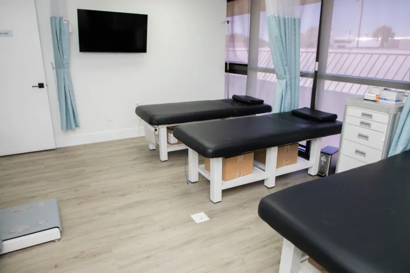 Entrust examination room with blue privacy curtains