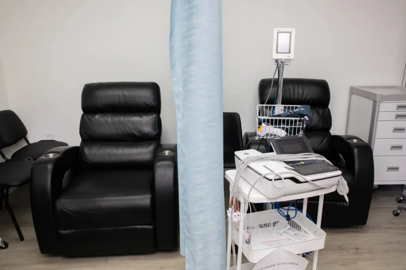 Black reclining chairs in an Entrust visit room
