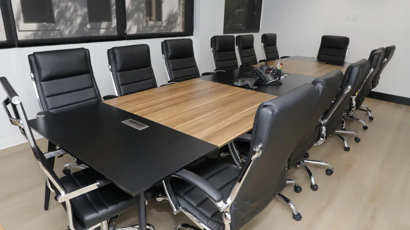 Entrust’s conference room with a long table and seating for research meetings
